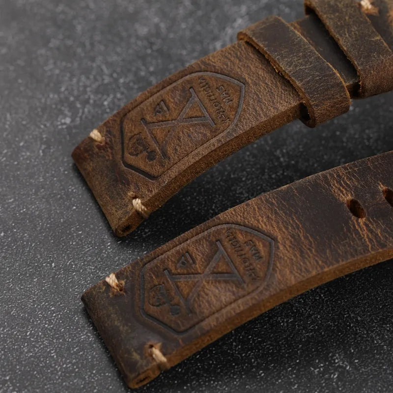 brown genuine leather watch strap accessory with silver clasp with engravings